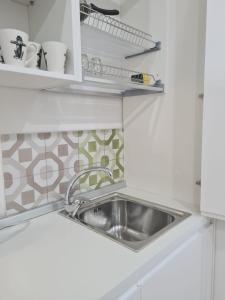 A kitchen or kitchenette at Casa D'Amato Salerno Még 37 kép