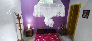 Postel nebo postele na pokoji v ubytování Aconchego Girassol