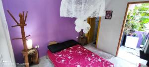 Postel nebo postele na pokoji v ubytování Aconchego Girassol