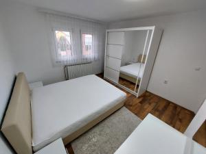 Un ou plusieurs lits dans un hébergement de l'établissement Apartment Zenović