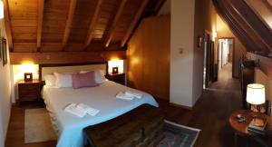 A bed or beds in a room at Excelsior. Espectacular y exclusivo apartamento en Sallent de Gállego.