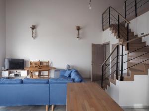 Гостиная зона в Melissinos Beachfront Apartments