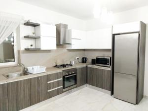 Η κουζίνα ή μικρή κουζίνα στο Large and modern apartment in the centre of Malta