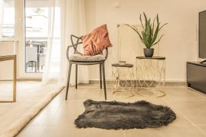 A seating area at Apollo's Apartment on Radio City Midas Home