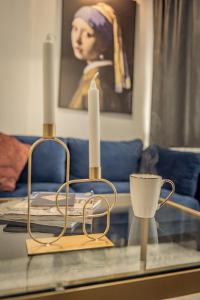 A seating area at Apollo's Apartment on Radio City Midas Home