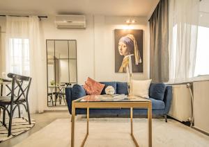 A seating area at Apollo's Apartment on Radio City Midas Home