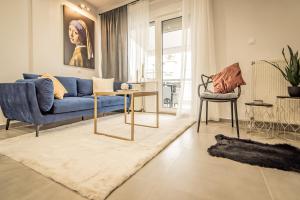 A seating area at Apollo's Apartment on Radio City Midas Home