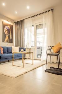 A seating area at Apollo's Apartment on Radio City Midas Home