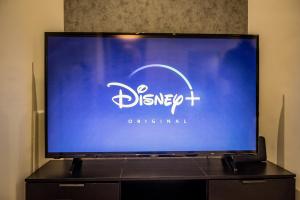 A television and/or entertainment centre at Apollo's Apartment on Radio City Midas Home