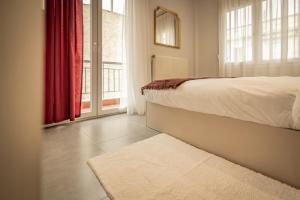 A bed or beds in a room at Apollo's Apartment on Radio City Midas Home