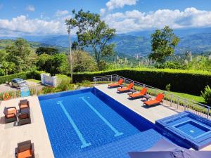 View ng pool sa CasaMIA Hotel Boutique - Villeta o sa malapit