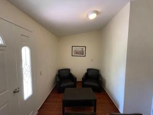 A seating area at Hotel Real Home
