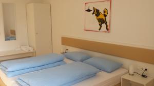 Postel nebo postele na pokoji v ubytování Manzoni Rooms