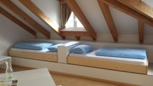 Postel nebo postele na pokoji v ubytování Manzoni Rooms
