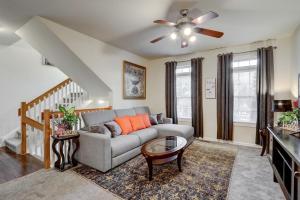 a living room with a couch and a ceiling fan at KC-Guesthouse in Wyomissing Hill, PA 