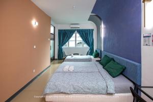 Postel nebo postele na pokoji v ubytování Knight Alley Hotel + 37 fotografií
