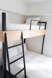 Katil atau katil-katil dalam bilik di Imu Hotel Kyoto