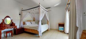 Ein Bett oder Betten in einem Zimmer der Unterkunft Sama Sama Amed