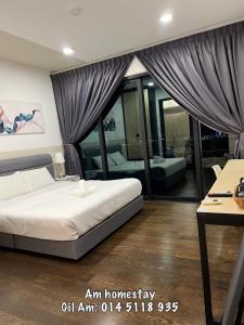 Katil atau katil-katil dalam bilik di Am almas suite studio