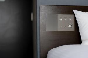 Postel nebo postele na pokoji v ubytování Hotel Vista Ebina
