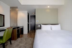 Postel nebo postele na pokoji v ubytování Hotel Vista Ebina + 36 fotografií