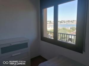 Ένα ή περισσότερα κρεβάτια σε δωμάτιο στο Riells mar