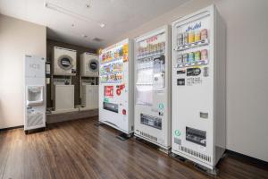 a row of vending machines in a room at Hotel Vista Ebina in Ebina