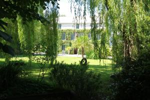 a view of the building from the garden at La Haute Flourie - bed and breakfast -chambres d'hôtes in Saint Malo