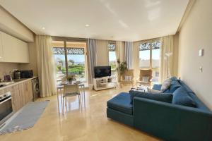 A kitchen or kitchenette at Proper & Plush 1 BDR Mangroovy Free Pool & Beach Access