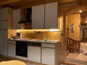 Kuchyň nebo kuchyňský kout v ubytování Haus Brugger + 28 fotografií
