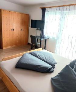 Postel nebo postele na pokoji v ubytování Apartment Steirawohnzimmer