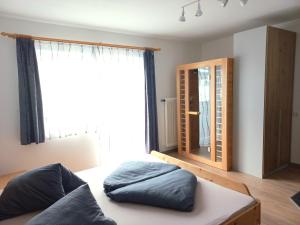 Postel nebo postele na pokoji v ubytování Apartment Steirawohnzimmer