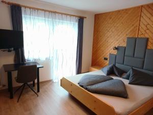 Postel nebo postele na pokoji v ubytování Apartment Steirawohnzimmer