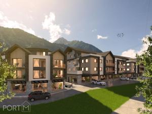 a rendering of an apartment complex with a parking lot at Sieghards Home in Mayrhofen
