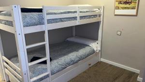 Postel nebo postele na pokoji v ubytování Apartamento D´Ousseau