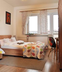 En eller flere senge i et værelse på Pokoje Gościnne UAnny