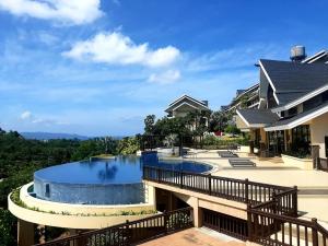 Bazén v ubytování Unit 306 Alta Vista de Boracay by David nebo v jeho okolí + 12 fotografií