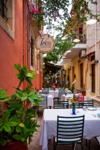 Reštaurácia alebo iné gastronomické zariadenie v ubytovaní Veneto Boutique Hotel