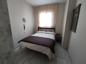 Posteľ alebo postele v izbe v ubytovaní Flamingo Sol Home