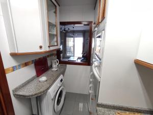 Kuchyňa alebo kuchynka v ubytovaní Flamingo Sol Home