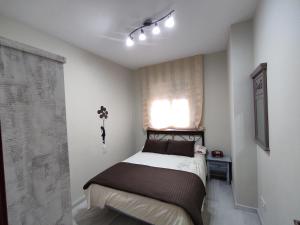 Posteľ alebo postele v izbe v ubytovaní Flamingo Sol Home