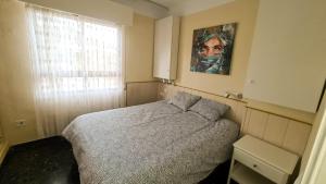 Łóżko lub łóżka w pokoju w obiekcie Penthouse Vistamar Torrox Costa