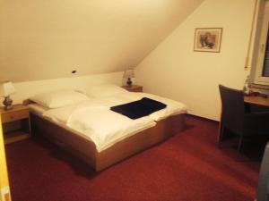 Postel nebo postele na pokoji v ubytování Hotel Friesenhof