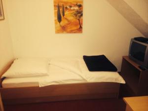 Postel nebo postele na pokoji v ubytování Hotel Friesenhof