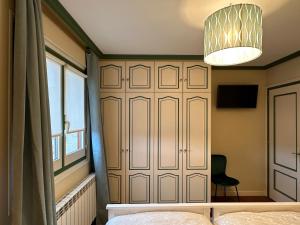 Łóżko lub łóżka w pokoju w obiekcie Apartamento Axpelarru