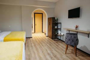 Voodi või voodid majutusasutuse GABATA INN toas