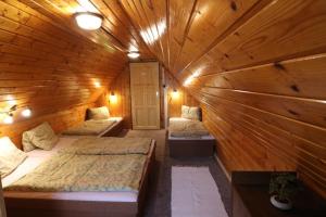 Postel nebo postele na pokoji v ubytování Hotel-Penzion Johanka