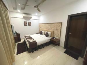 Postel nebo postele na pokoji v ubytování Hotel Goa Continental - Baga