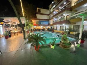 Bazén v ubytování Hotel Goa Continental - Baga nebo v jeho okolí