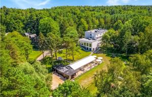 an aerial view of a building in the middle of a forest at Nice Home In Frombork With Kitchen in Frombork
